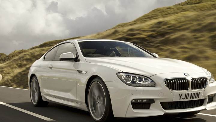 Running Near Hill Station 2012 BMW 6 Series Coupe In White